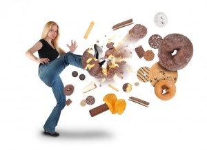 woman kicking junk food