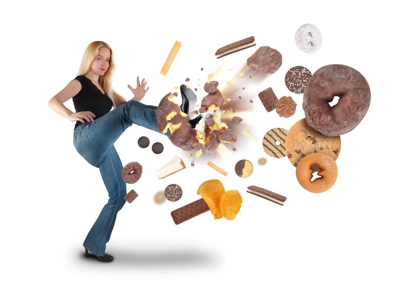 woman-kicking-junk-food