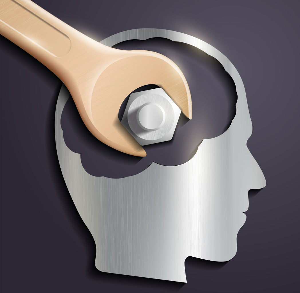 38629380 – human head and a wrench with a nut